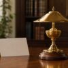 Polished brass oil lamp presented as a donor appreciation thank-you gift