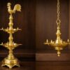 Comparison of hanging brass oil lamp පහන් තිර and traditional kukula pahana oil lamp